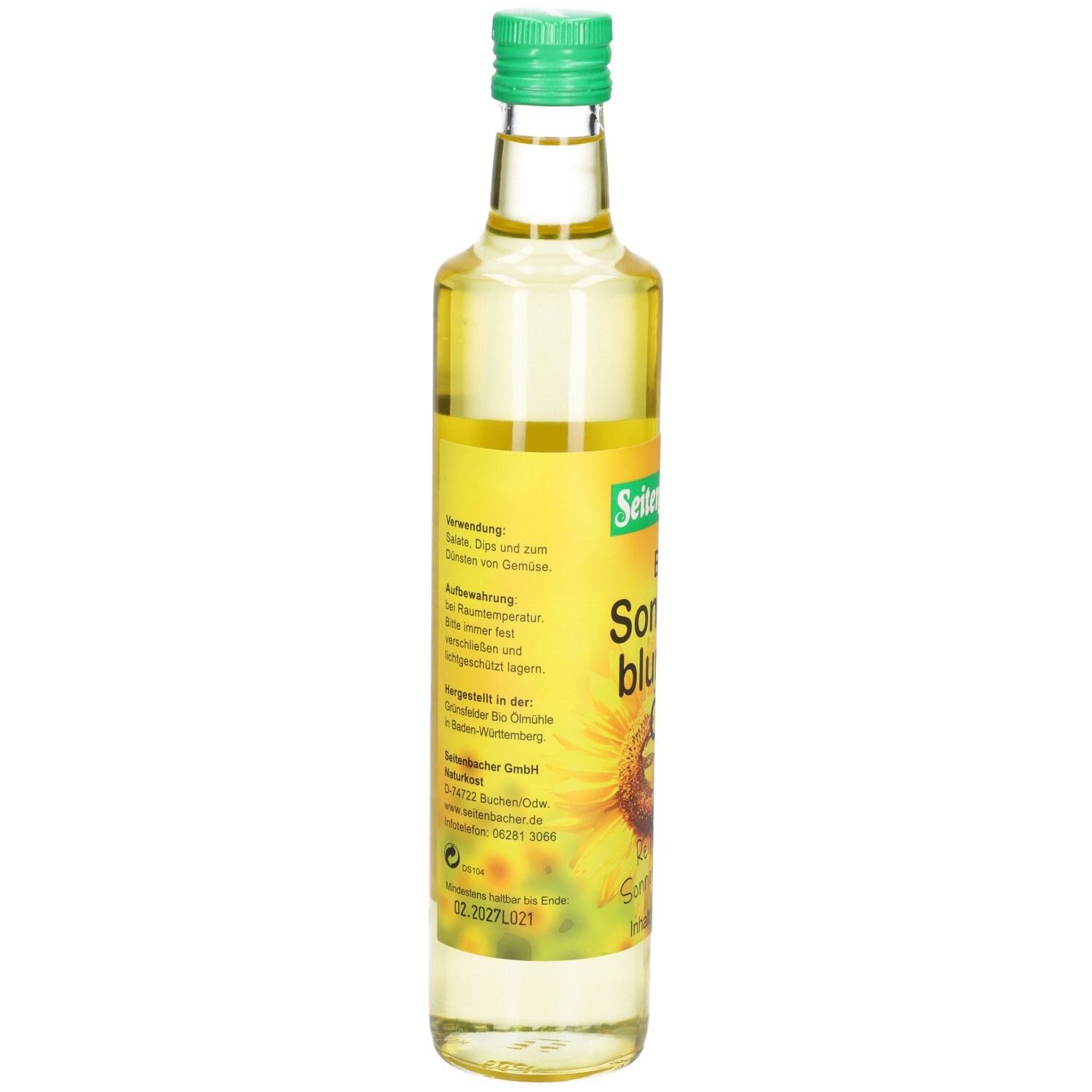 Rückseite der Glasflasche. Etikett mit Informationen zu Verwendung, Inhaltsstoffen und Hersteller.