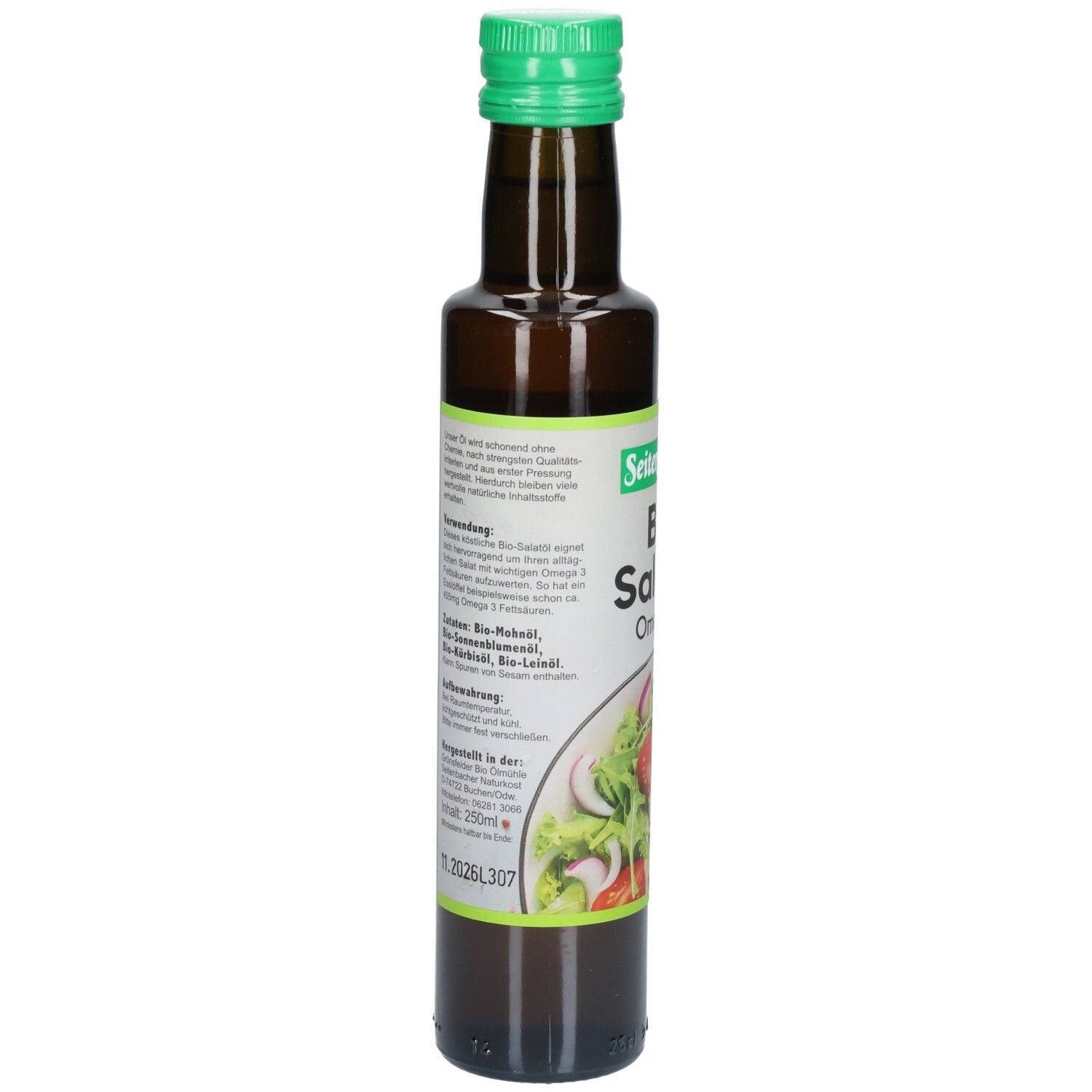 Bouteille en verre brun avec bouchon vert. Étiquette avec informations sur le produit et ingrédients. Illustration de salade.