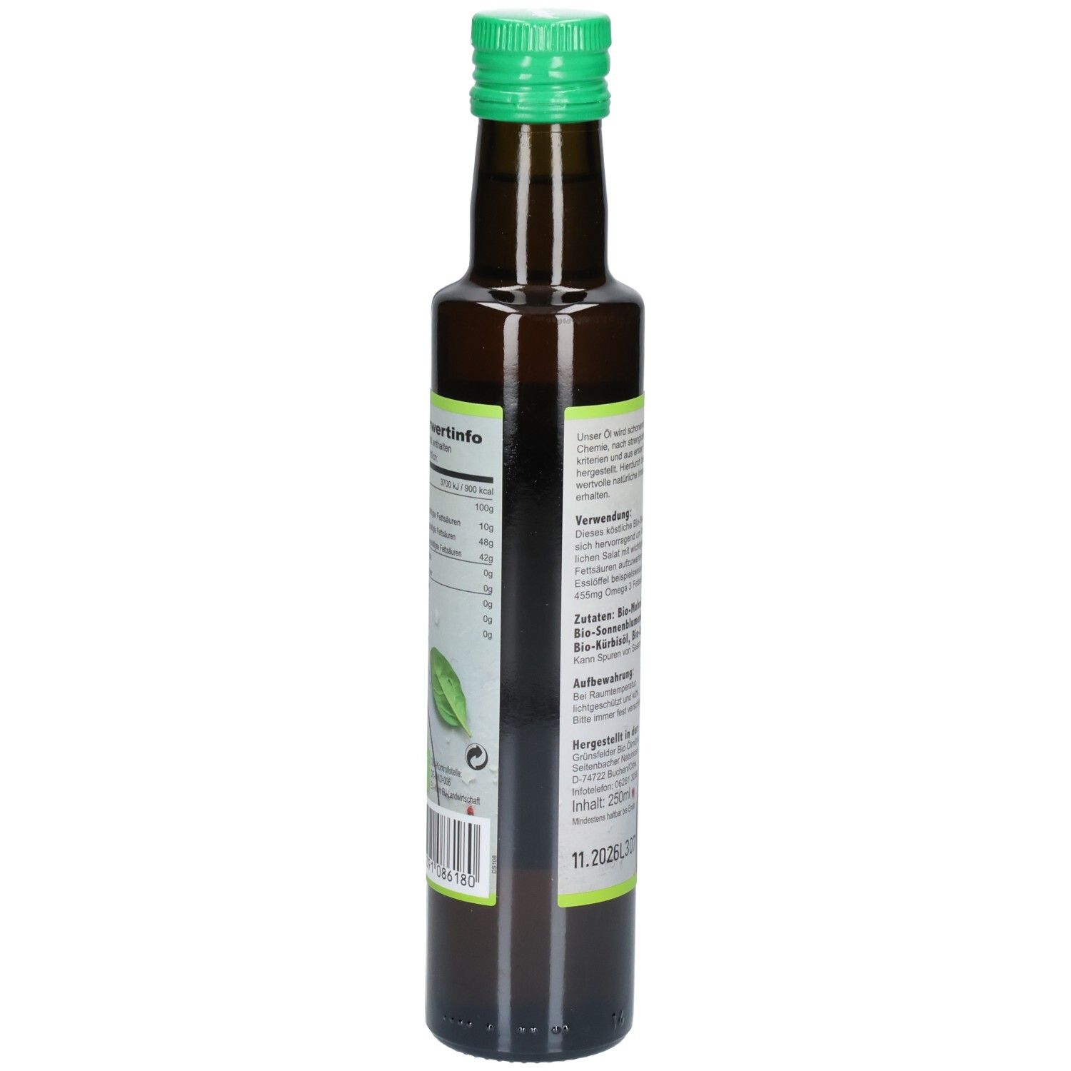 Bouteille en verre brun avec bouchon vert. Étiquette avec informations nutritionnelles et ingrédients. Vue arrière.