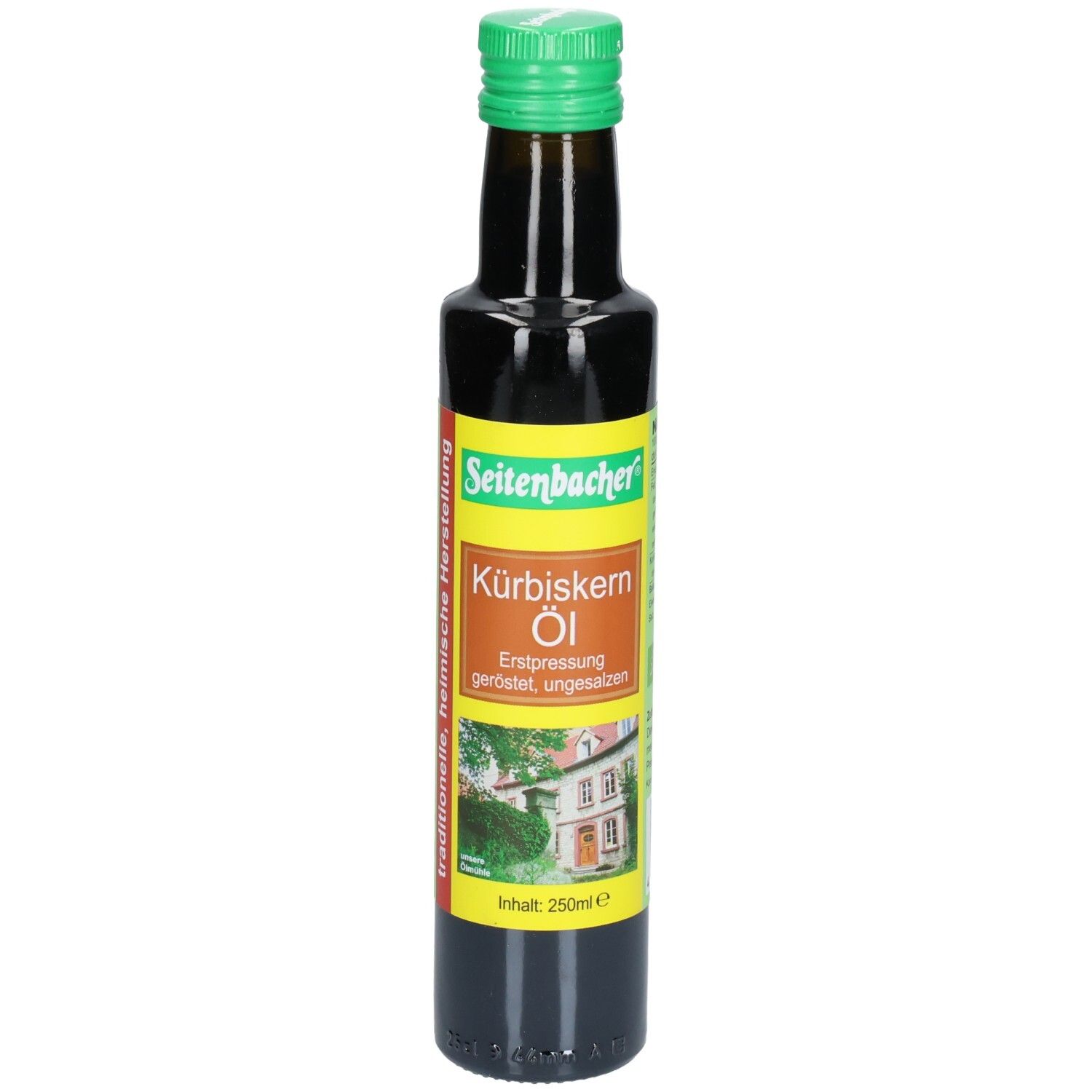 Bouteille en verre brun avec bouchon vert. Étiquette avec nom du produit et image d'une maison. Seitenbacher Kürbiskern Öl.