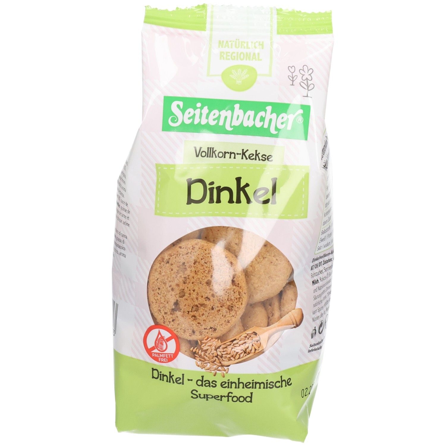 Verpackung mit Keksen. Marke Seitenbacher, Vollkorn-Kekse Dinkel. Sichtbare Kekse, braun, rund. Aufdruck: Dinkel - das einheimische Superfood.