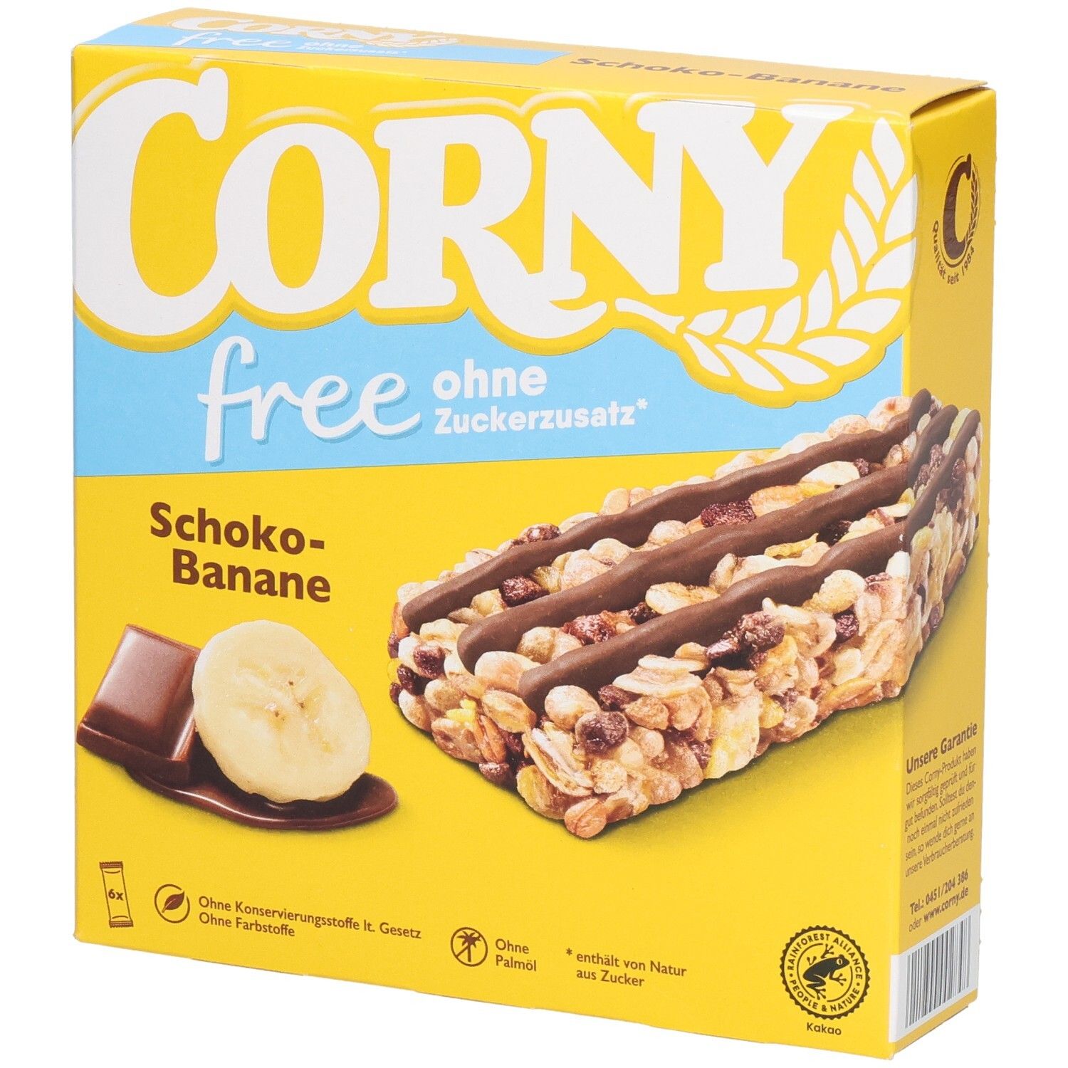 Gelbe Schachtel mit Corny free Schoko-Banane Riegeln. Aufdrucke: "ohne Zuckerzusatz", Banane, Schokolade, und Produktabbildung.