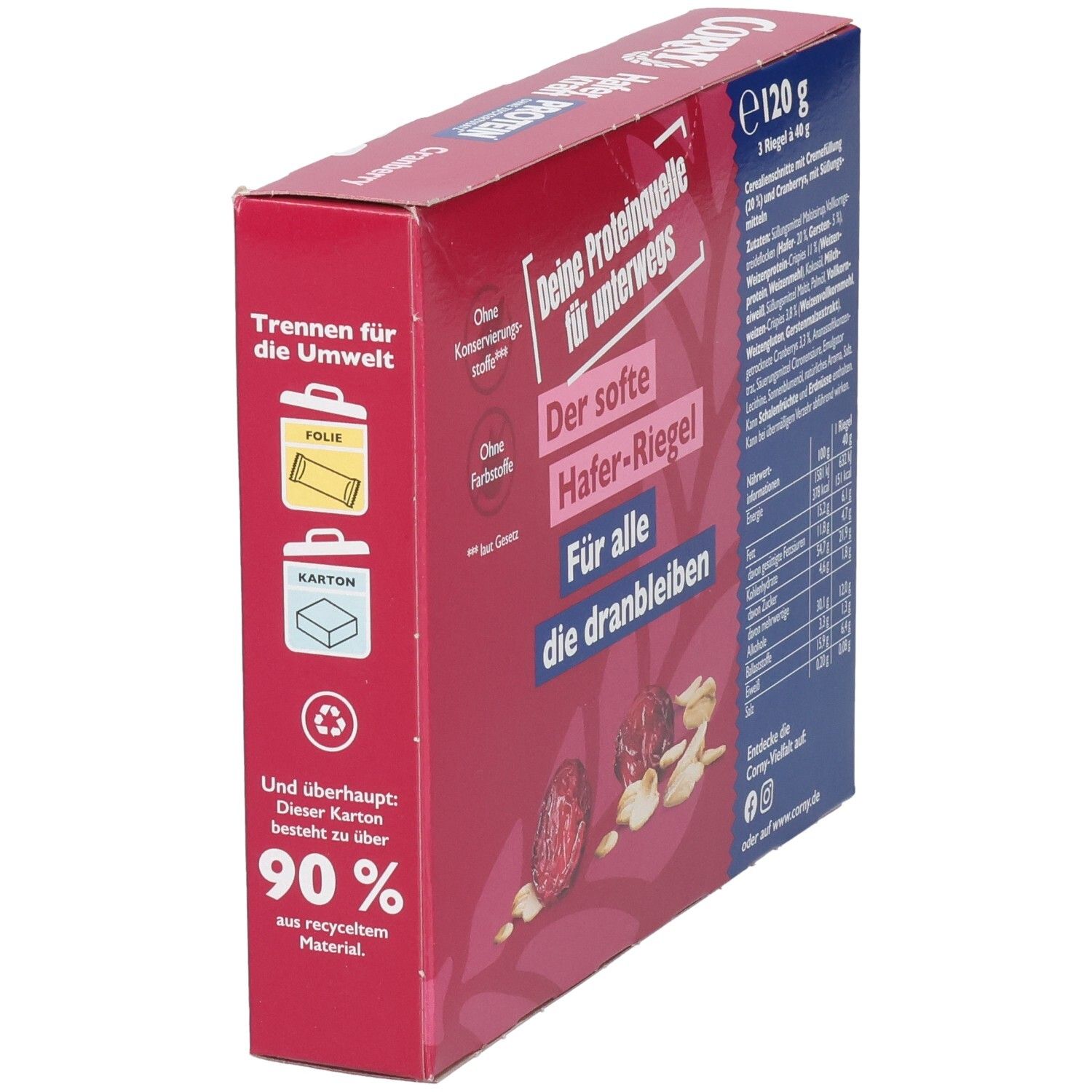 Boîte rouge Corny Haferkraft Protein Cranberry, vue latérale. Texte : Protéines, sans sucre ajouté. Illustré : canneberges, flocons d'avoine et barre.