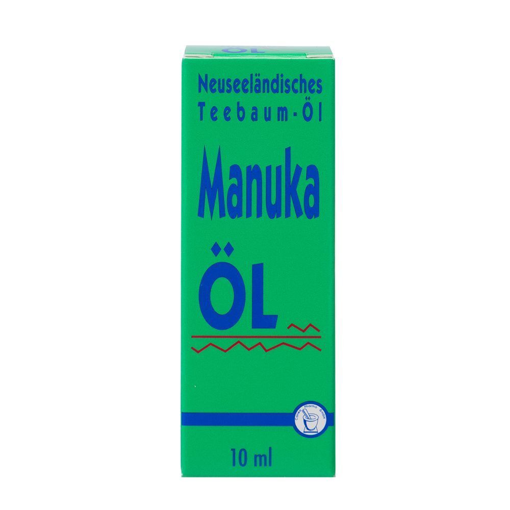 Grüne Schachtel mit blauem "Manuka Öl"-Schriftzug. Oben steht "Neuseeländisches Teebaum-Öl". Unten: "10 ml".