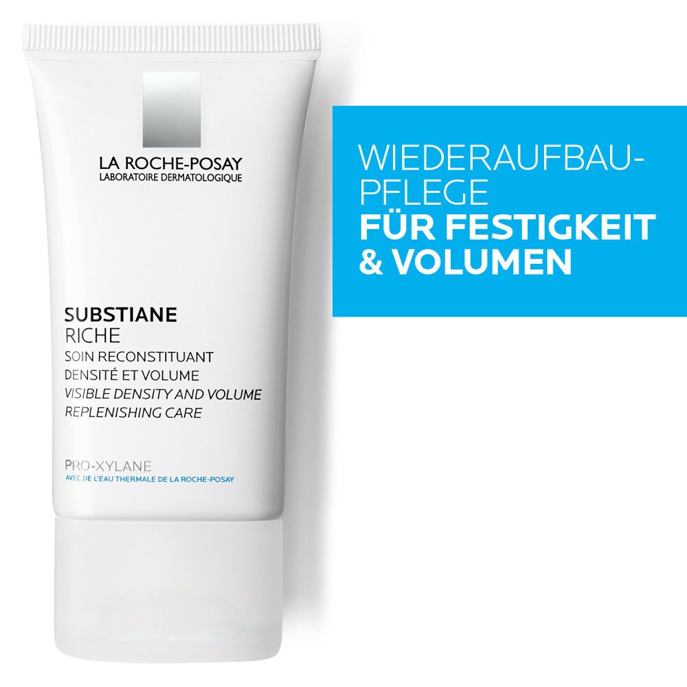 Weiße Tube mit Aufschrift: La Roche-Posay, Substiane Riche. Blaue Karte mit Text: Wiederaufbau-Pflege für Festigkeit & Volumen.