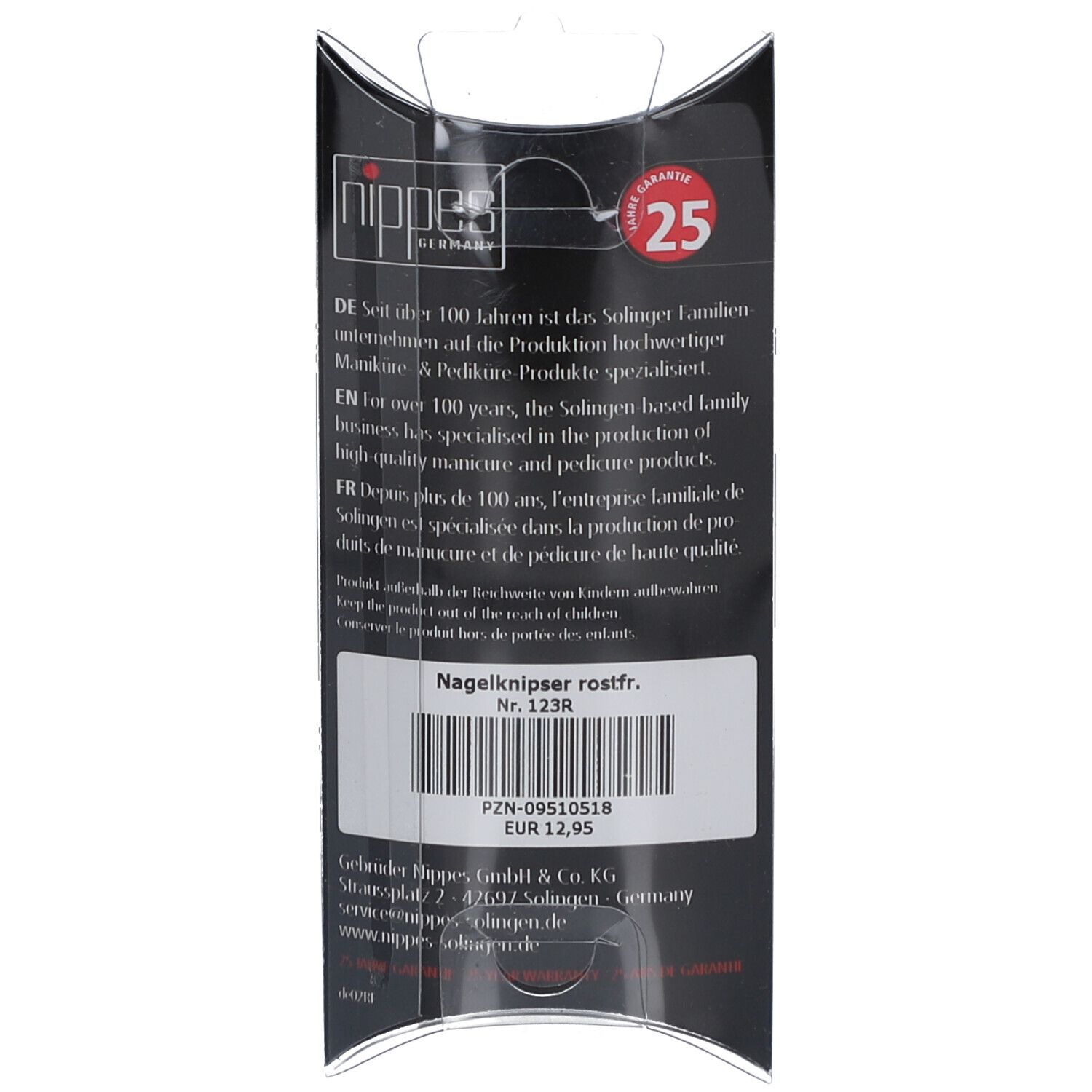 Dos de l'emballage avec texte et informations sur le produit. Coupe-ongles inoxydable, n° 123R. Garantie 25 ans.