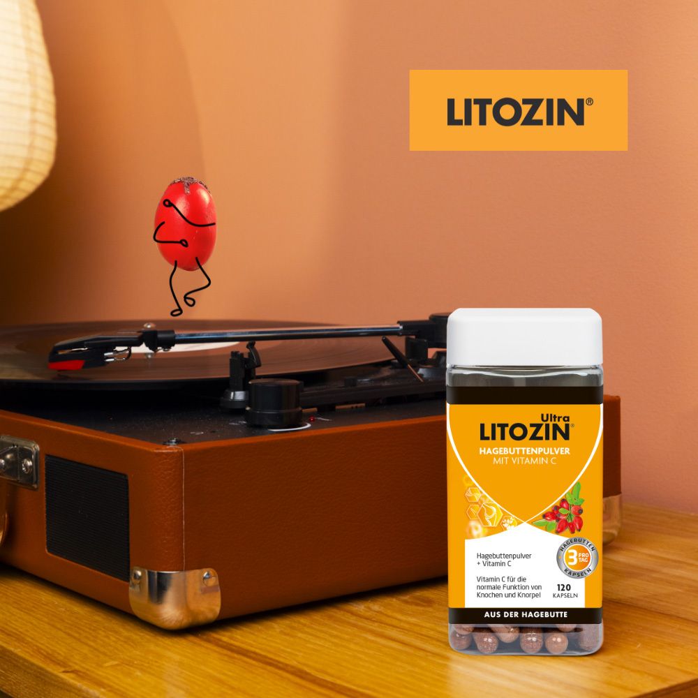 LITOZIN® Ultra Kapseln neben einem Plattenspieler. Dose mit 120 Kapseln. Aufschrift: Hagebuttenpulver mit Vitamin C.