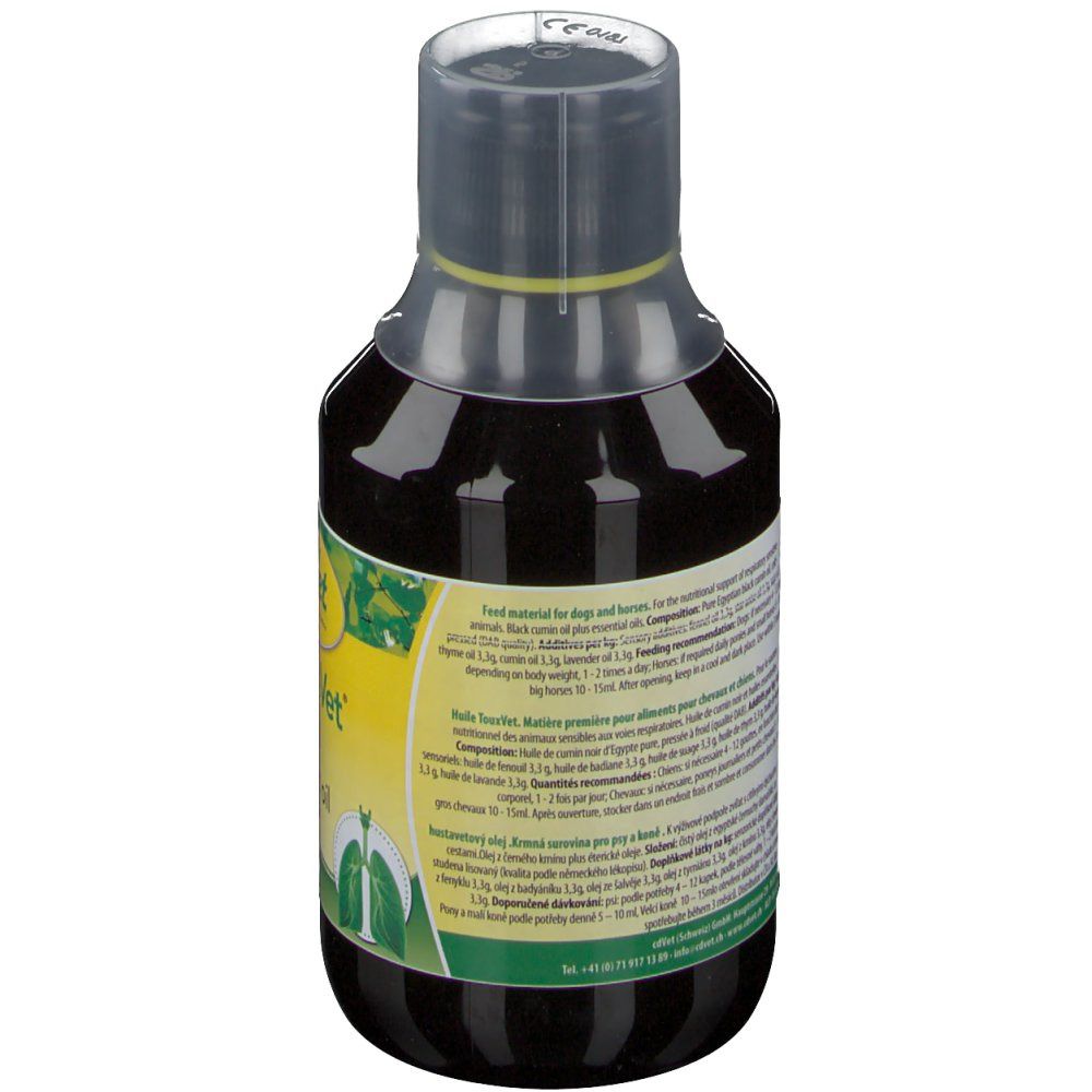 Rückansicht einer Flasche mit brauner Flüssigkeit. Auf dem Etikett sind Informationen über die Inhaltsstoffe und die Fütterung angegeben.