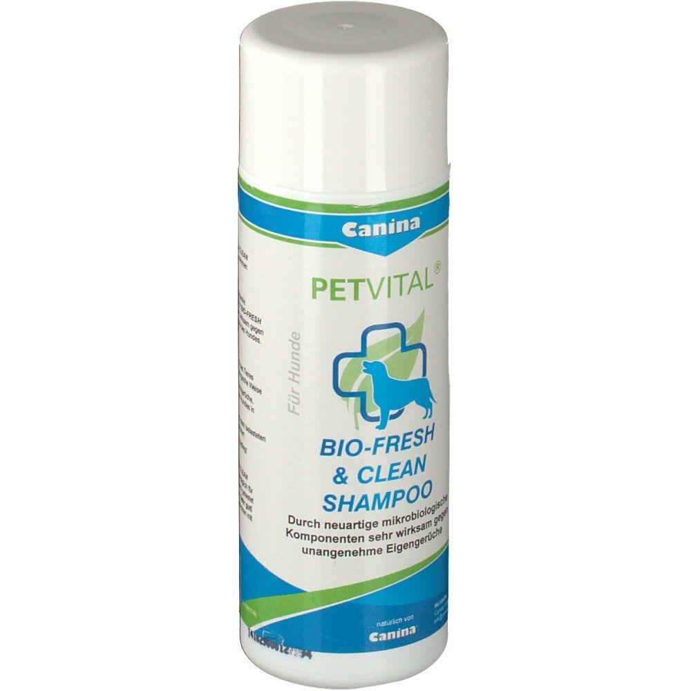 Weiße Flasche mit blau-grüner Banderole. Aufschrift: Canina PETVITAL BIO-FRESH & CLEAN Shampoo. Logo: Hund im Kreuz.