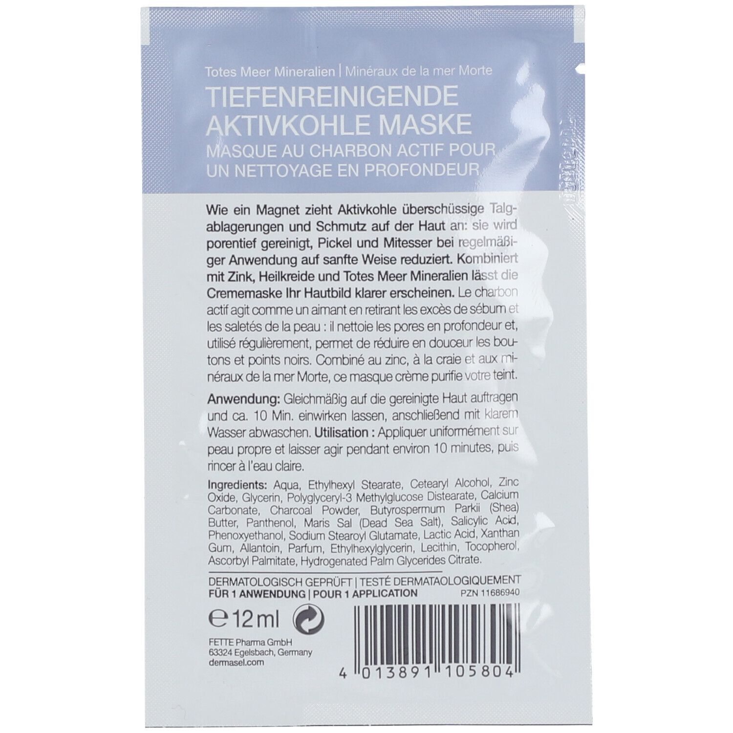 Rückseite der Aktivkohlemaske. Text: Tiefenreinigende Aktivkohle Maske. Inhaltsstoffe, Anwendungshinweise. Dermatologisch getestet. 1 Anwendung.