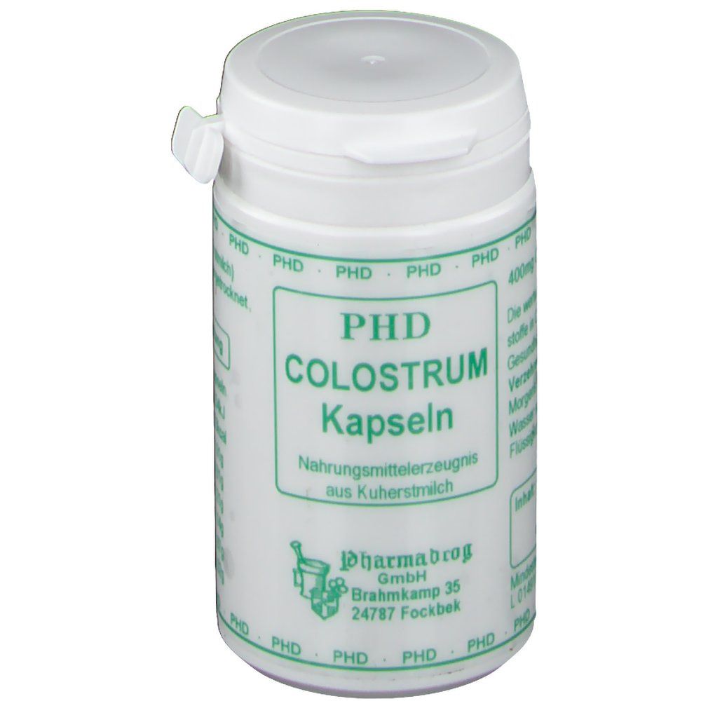 Weiße Dose mit grünem Etikett. Aufschrift: PHD Colostrum Kapseln. Nahrungsergänzungsmittel aus Kuhmilch. Logo: Pharmadrog.