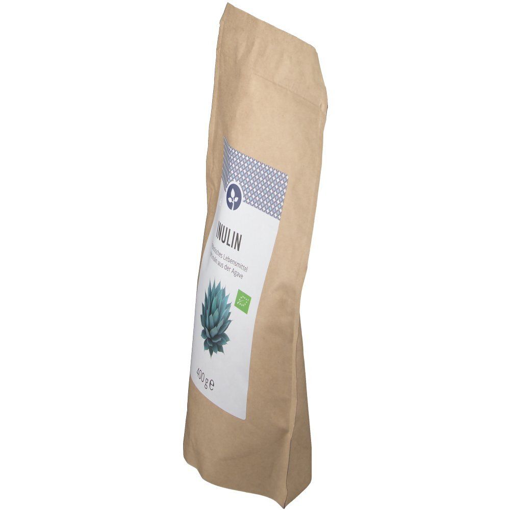 Sachet en papier brun, vue latérale. Étiquette blanche avec inscription INULINE, illustration d'agave, label bio. Sachet légèrement incliné.
