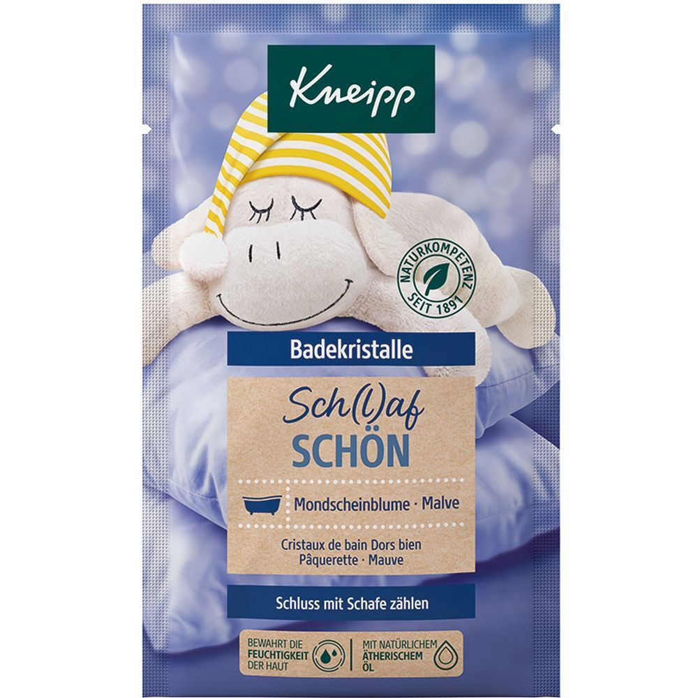 Kneipp® Cristaux de bain Sch(l)af schön. Emballage bleu avec illustration de mouton. Nom du produit et ingrédients imprimés.