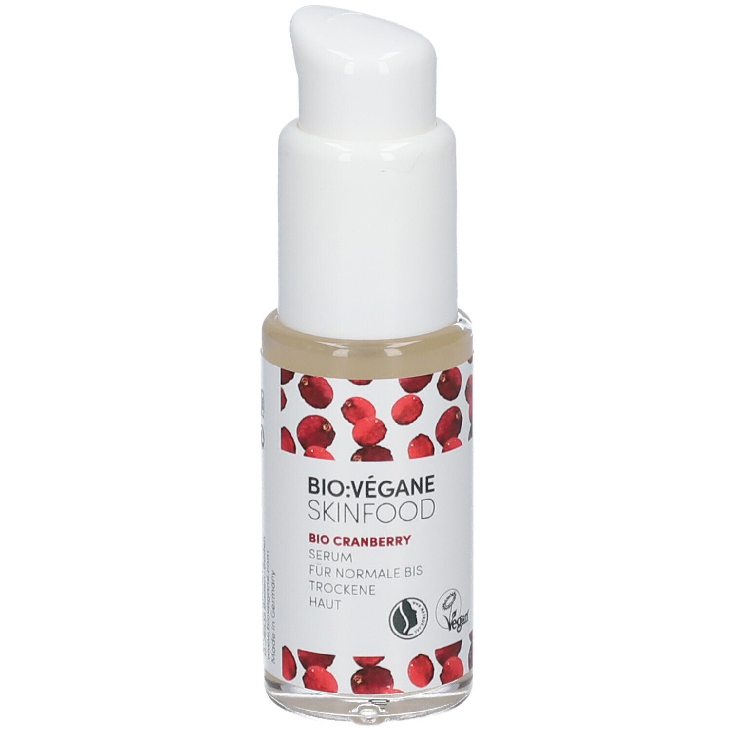 Flacon de sérum avec pompe blanche. Inscription : BIO:VÉGANE SKINFOOD, Organic Cranberry Serum, pour peaux normales à sèches. Label Vegan.