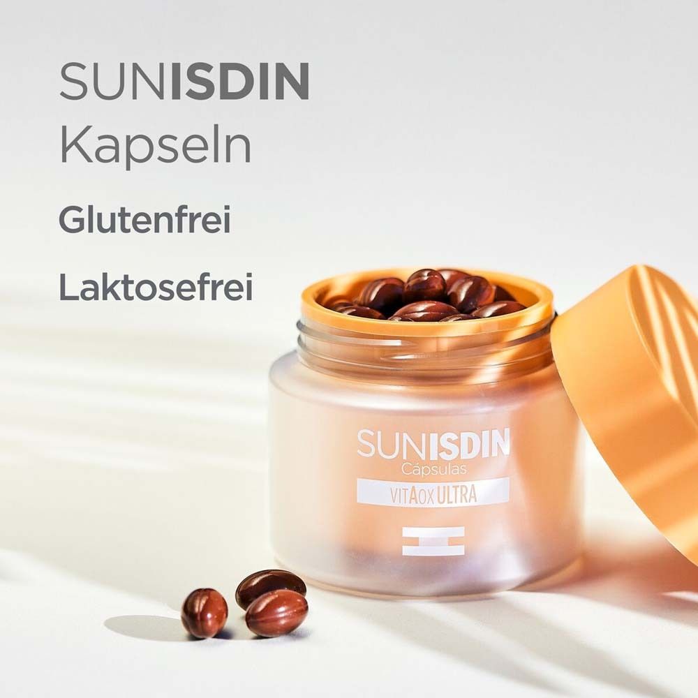Behälter mit SunISDIN Kapseln, geöffnet. Text: SunISDIN Kapseln, glutenfrei, laktosefrei. Kapseln sichtbar.