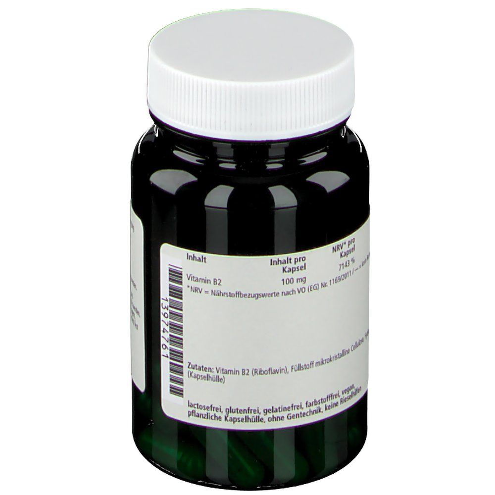 Rückseite der grünen Flasche mit weißem Deckel. Etikett mit Informationen: Inhaltsstoffe, Nährwertangaben, Hersteller.