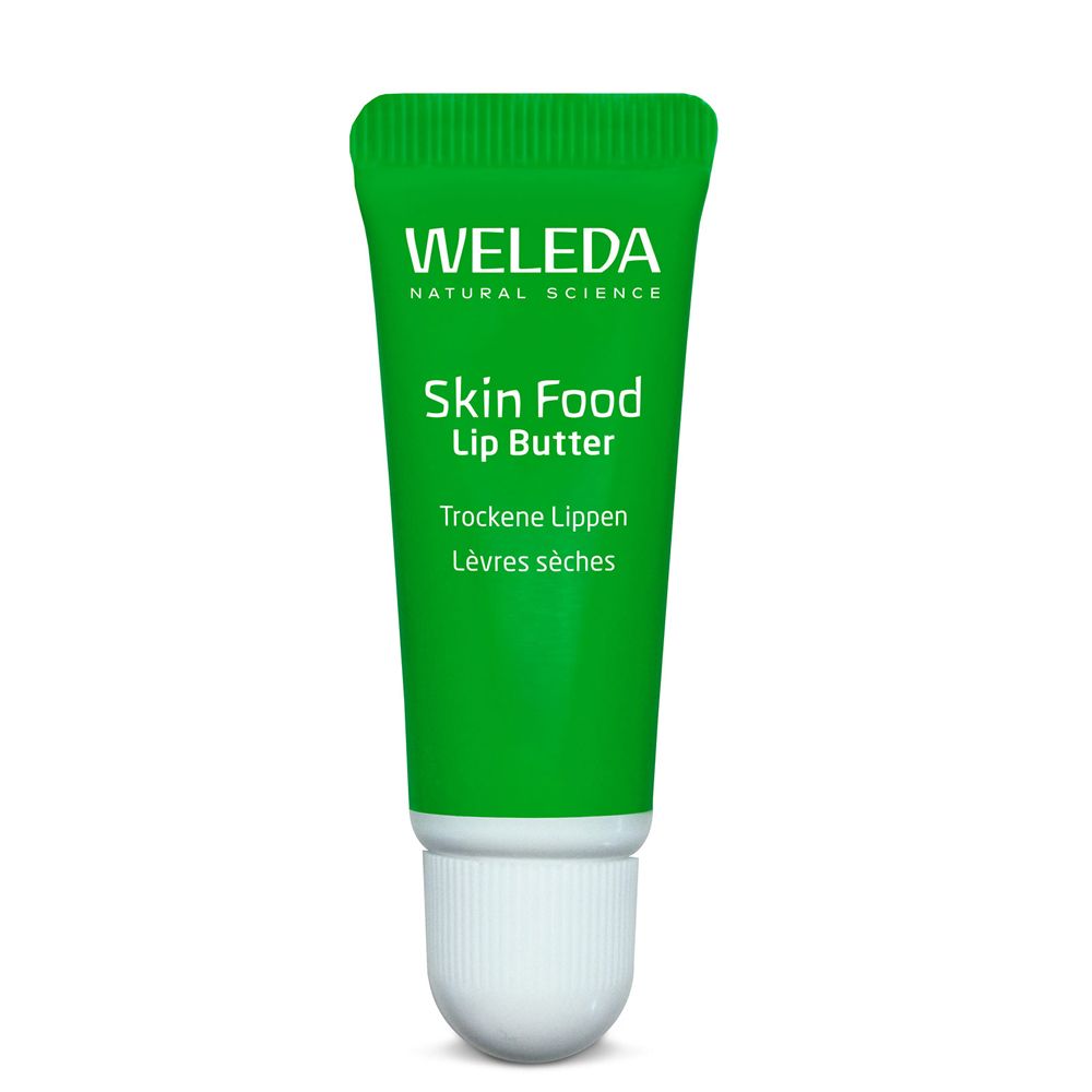 Grüne Tube Skin Food Lip Butter. Text: WELEDA, Skin Food Lip Butter, Trockene Lippen, Lèvres sèches.