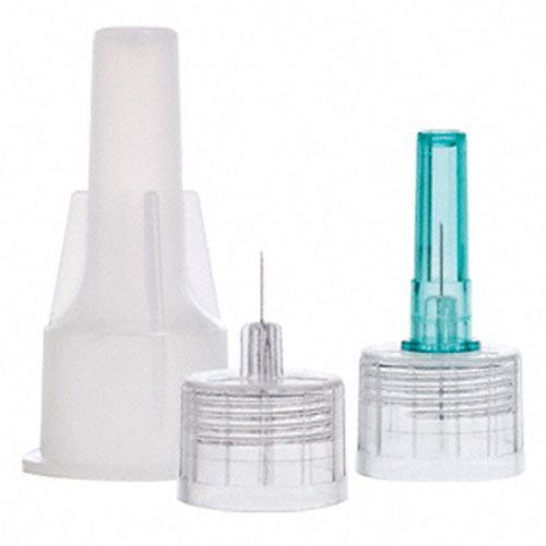 Composants de canules. Pièces en plastique transparent et vert avec aiguilles métalliques. Différentes tailles et formes.