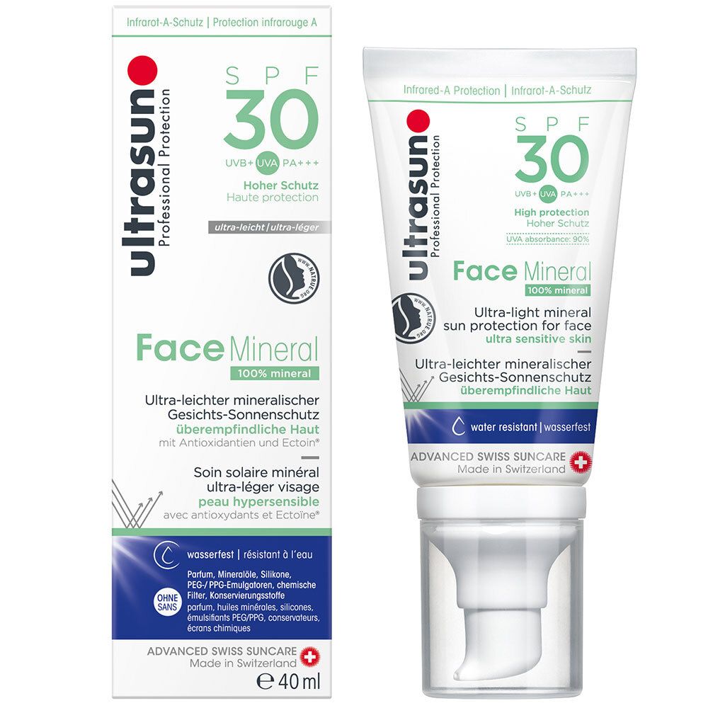 Tube et emballage de crème solaire. Blanc, avec des accents verts et rouges. Inscription : ultrasun Face Mineral SPF 30.