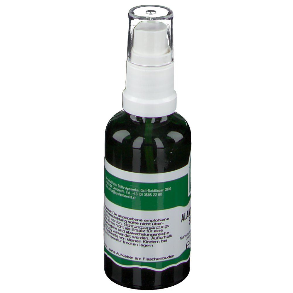 Flacon pulvérisateur vert avec tête blanche. Texte et logo. Vue détaillée de l'étiquetage.