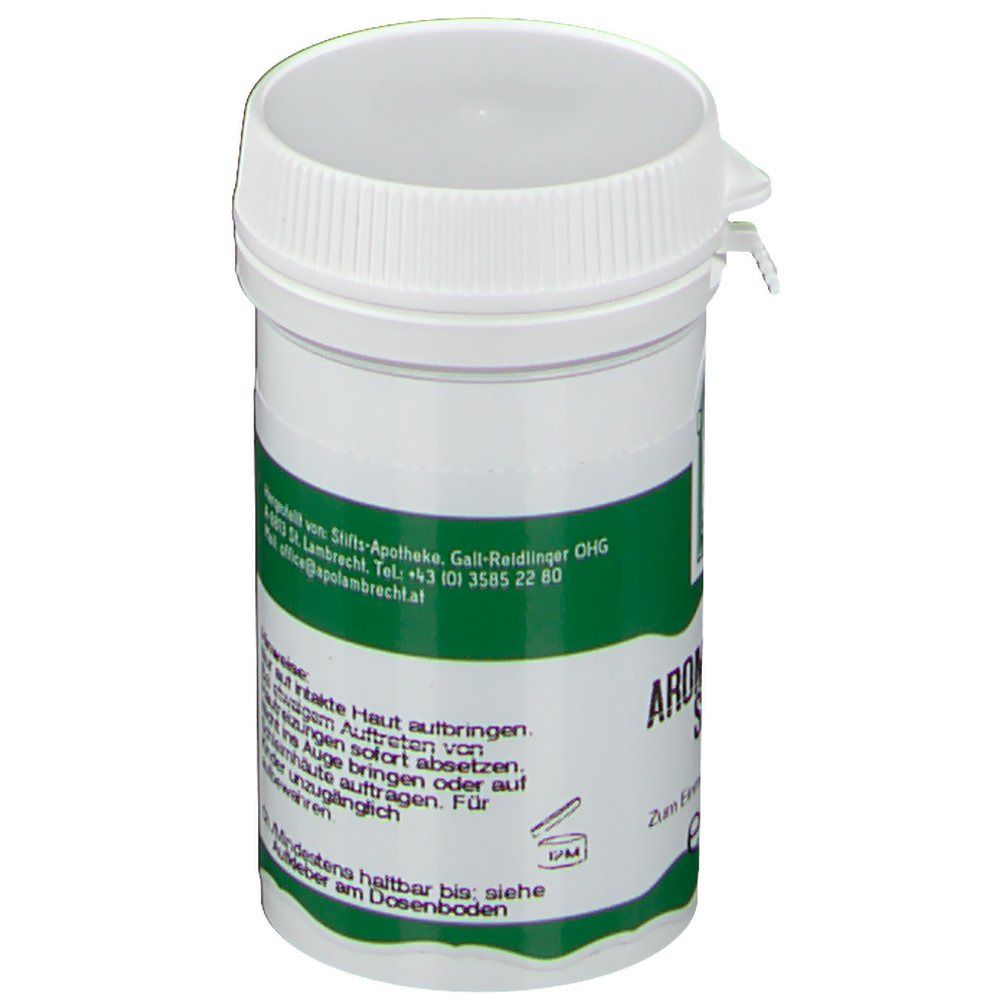 Pot blanc et vert avec couvercle. Inscription : Hinweise, informations fabricant.