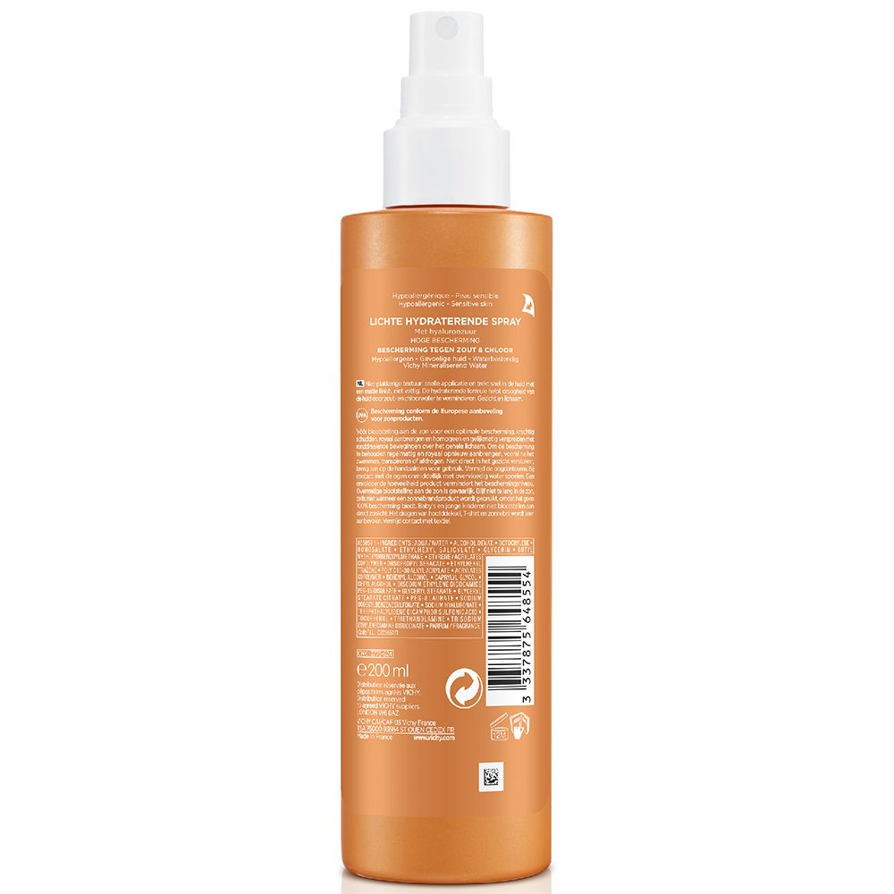 Dos d'un flacon de crème solaire orange. Texte et logos sur l'étiquette. Contient des informations sur le produit et la marque.