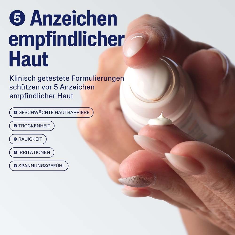 Gros plan sur crème. Texte: 5 signes de peau sensible. Produits Cetaphil.