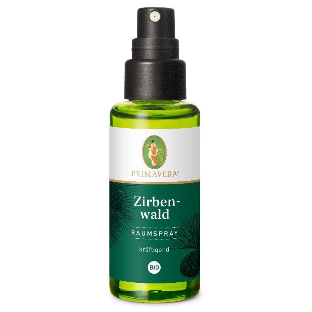 Flacon en verre vert avec vaporisateur noir. Inscription: PRIMAVERA, Zirbenwald, Raumspray, BIO. Étiquette avec branche de pin.