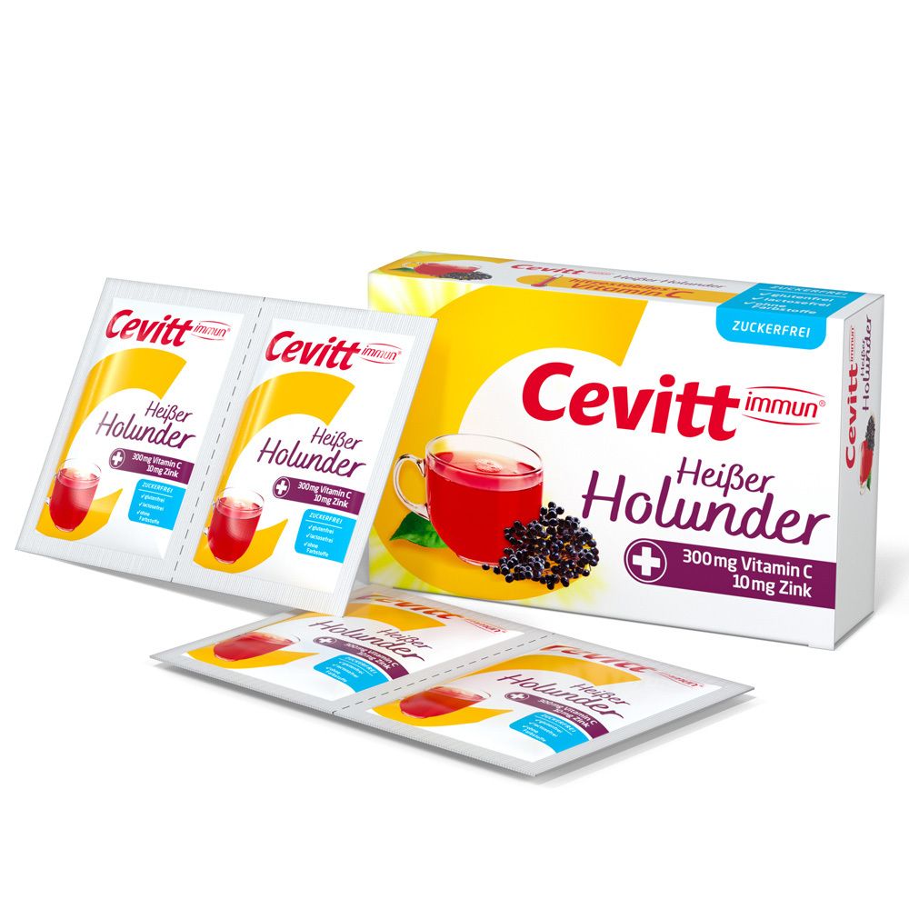 Cevitt immun Heißer Holunder sans sucre. Boîte et sachets individuels. Boisson, baies de sureau et vitamine C. Emballage blanc et jaune.