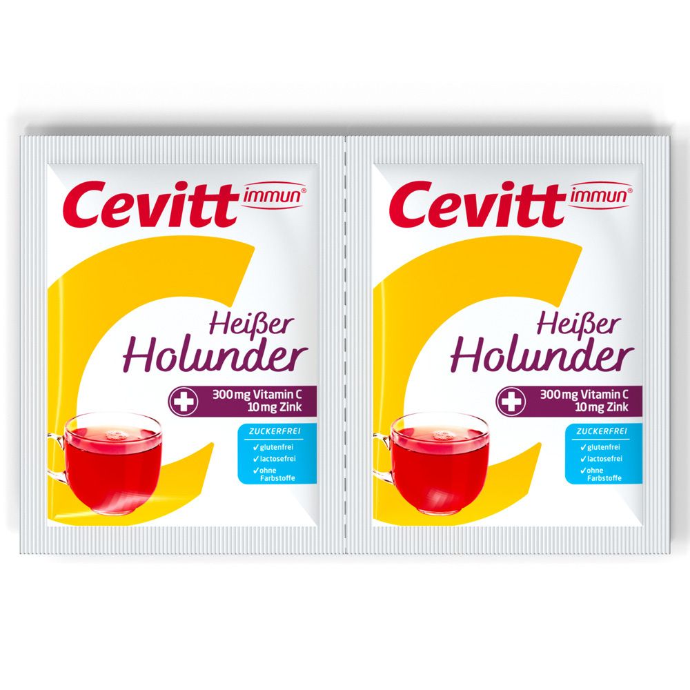 Zwei Cevitt immun® Heißer Holunder zuckerfrei Einzelbeutel. Produktabbildung, Glas, Holunderbeeren.
