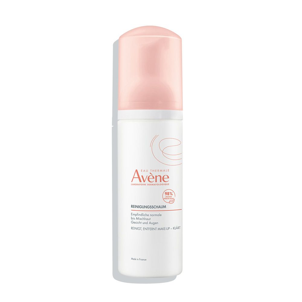 Flacon de mousse nettoyante Avène, blanc et rose. Texte: Mousse nettoyante, peaux sensibles normales à mixtes.