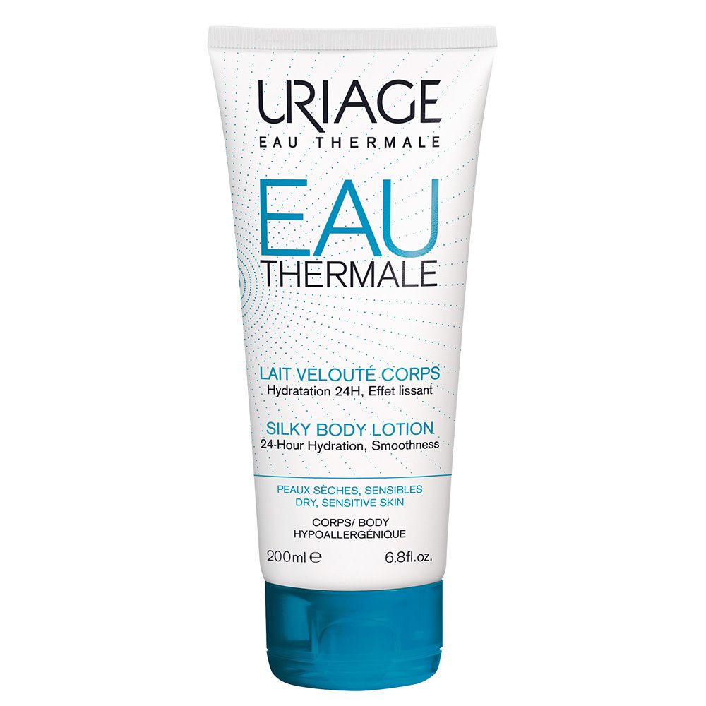 Tube blanc avec bouchon bleu. Inscription: URIAGE EAU THERMALE, EAU THERMALE, SILKY BODY LOTION. Pour peaux sèches, sensibles.