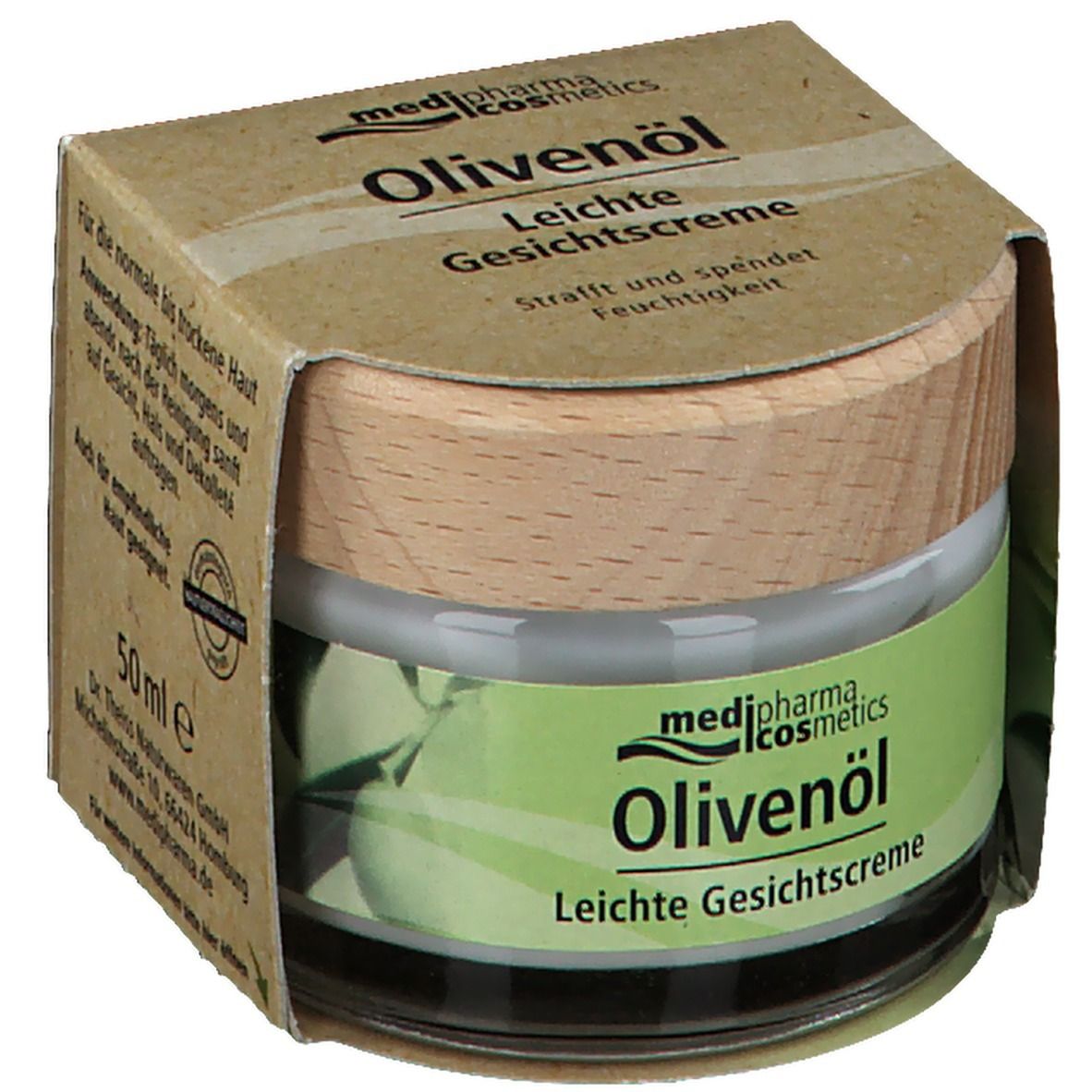 Pot de crème avec couvercle en bois dans un emballage en carton. Inscription : Olivenöl Leichte Gesichtscreme, medi-pharma cosmetics. 50 ml.