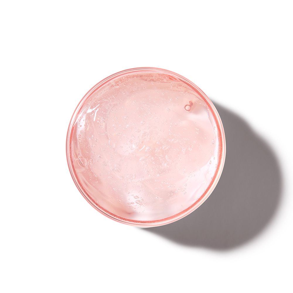 Rosa Gel in einem runden Behälter, Draufsicht.