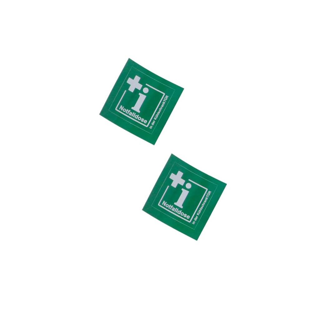 Deux autocollants carrés verts avec symbole croix-i blanc et inscription Notfalldose.