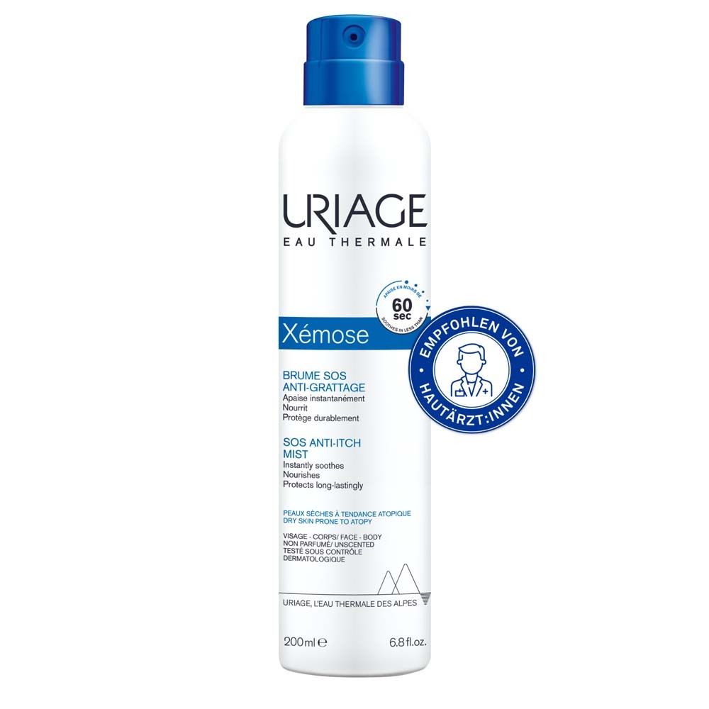 Spray blanc à bouchon bleu. Inscription : URIAGE, Xémose, Brume SOS Anti-grattage. Recommandé par les dermatologues.