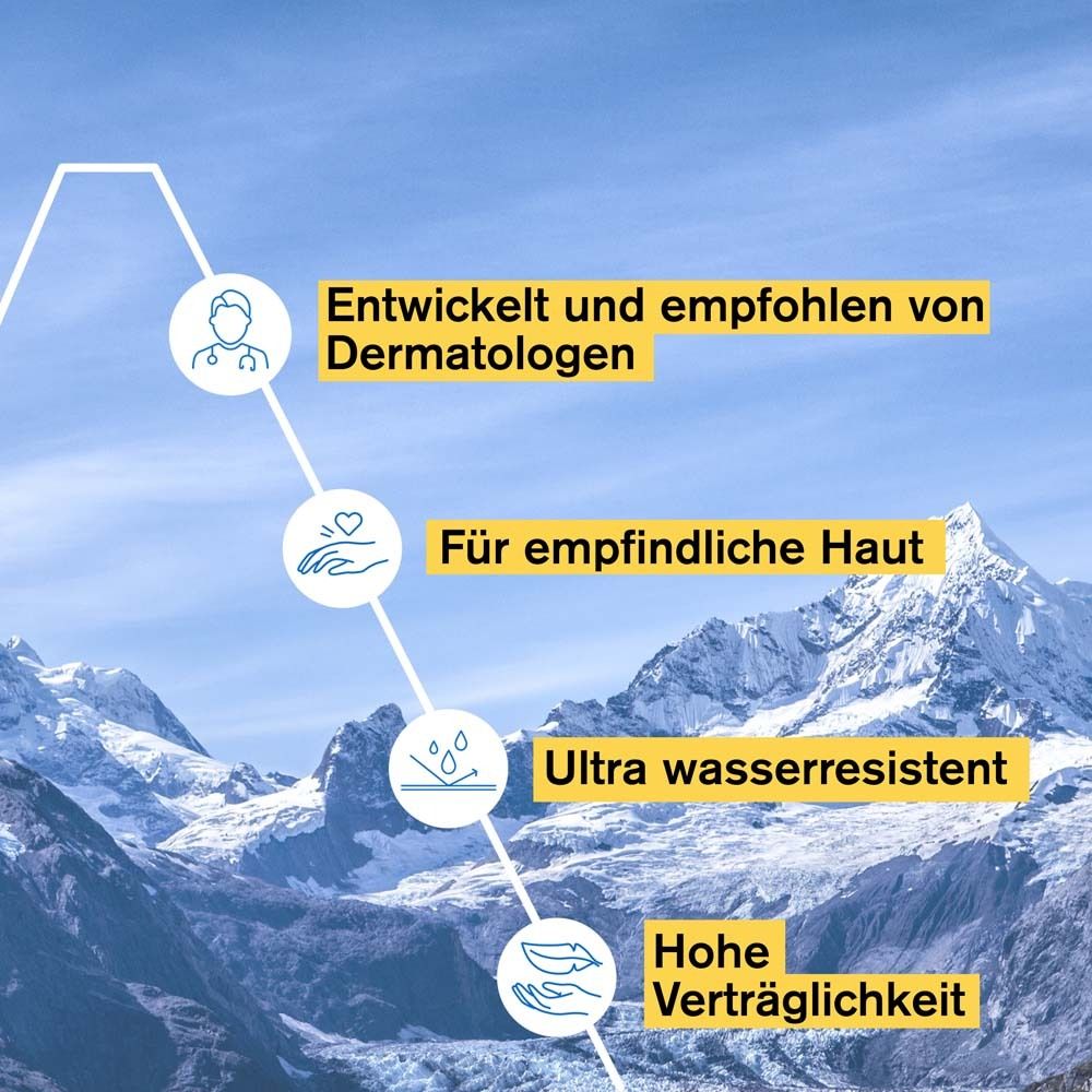 Texte: Développé et recommandé par les dermatologues. Pour peaux sensibles. Ultra résistant à l'eau. Haute tolérance.