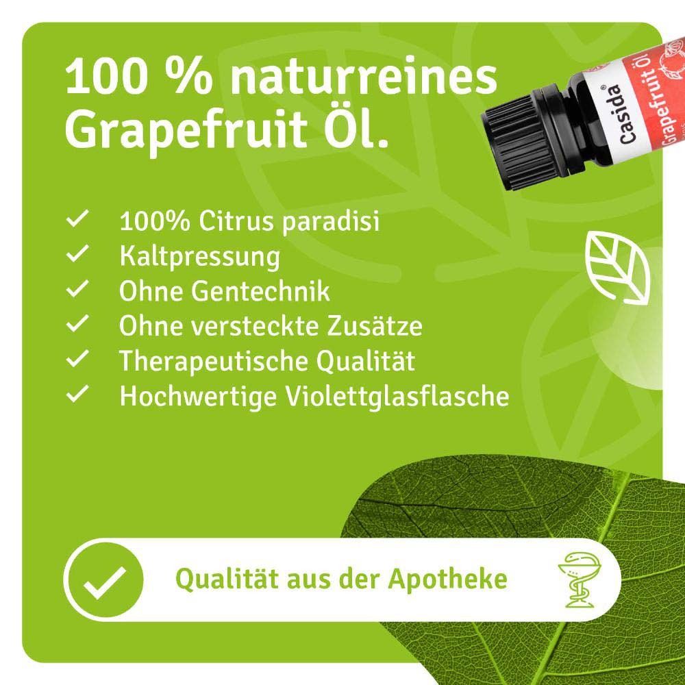 Bouteille d'huile de pamplemousse Casida® avec texte. 100% huile de pamplemousse pure. Pressage à froid, sans OGM, qualité thérapeutique, flacon en verre violet.