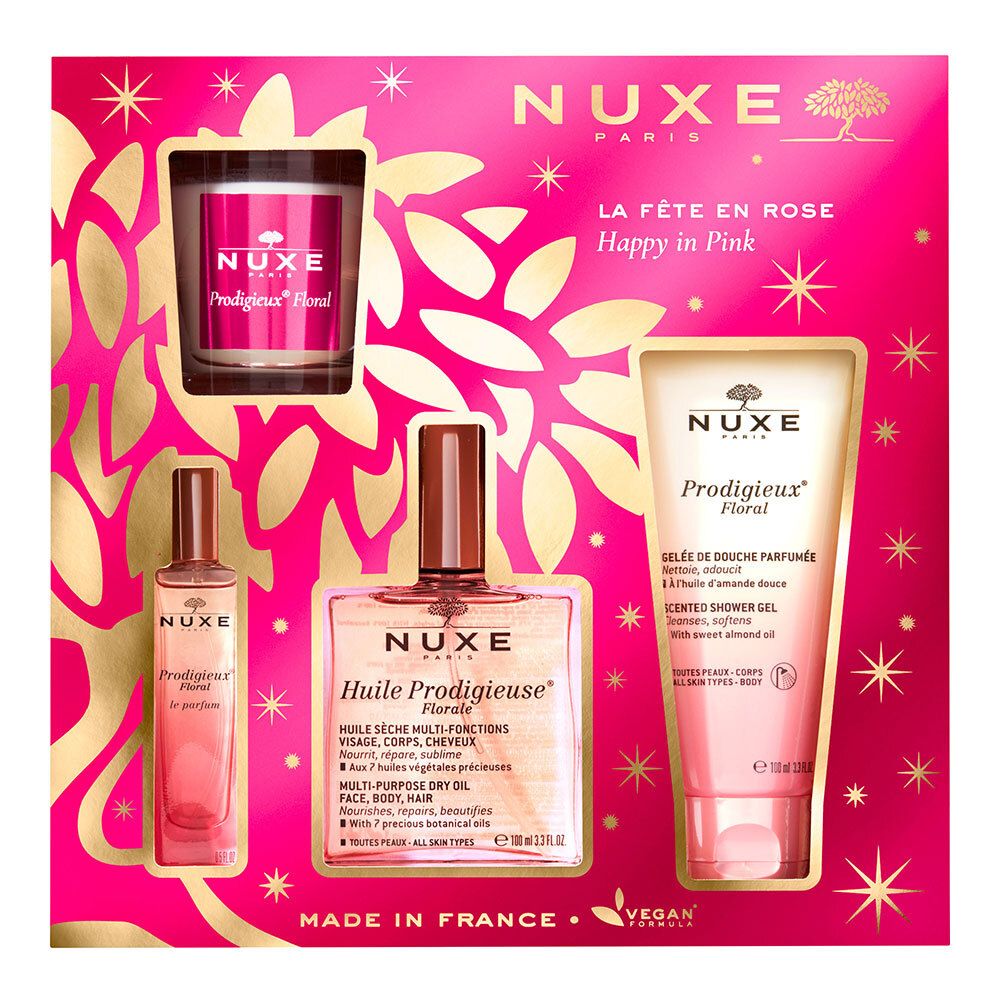Coffret cadeau NUXE Floral. Contient bougie, huile sèche, gel douche et parfum. Emballage rose avec détails dorés. Vegan.
