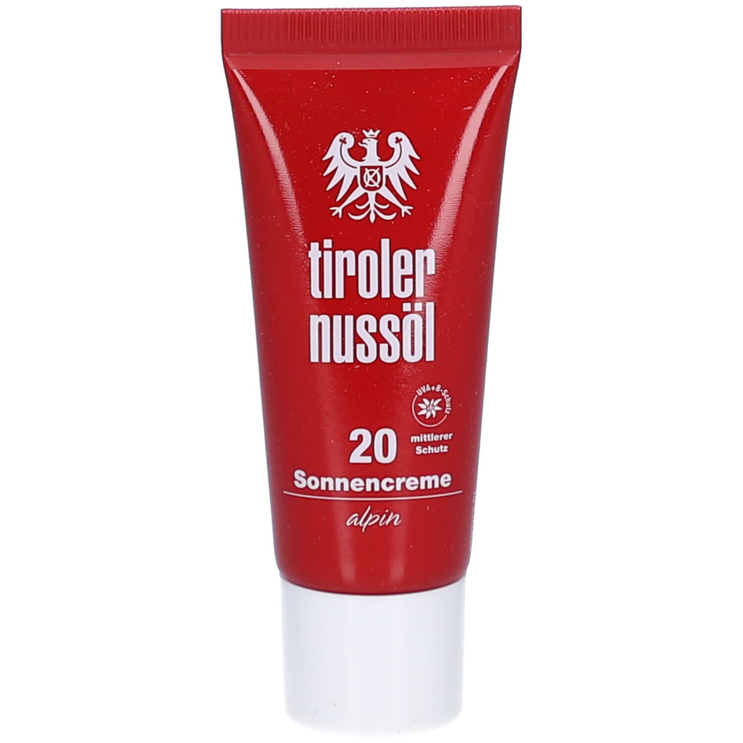 Rote Tube mit weißem Verschluss. Aufschrift: tiroler nussöl, 20 Sonnencreme alpin. Logo mit Adler.