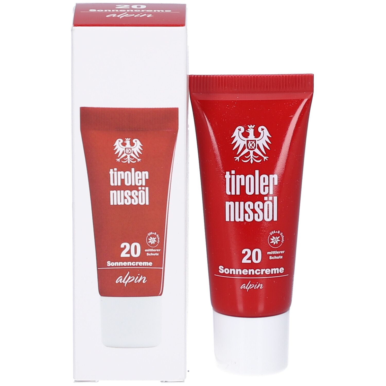 Produkt und Verpackung. Rote Tube und weiße Schachtel. Aufschrift: tiroler nussöl, 20 Sonnencreme alpin. Logo.