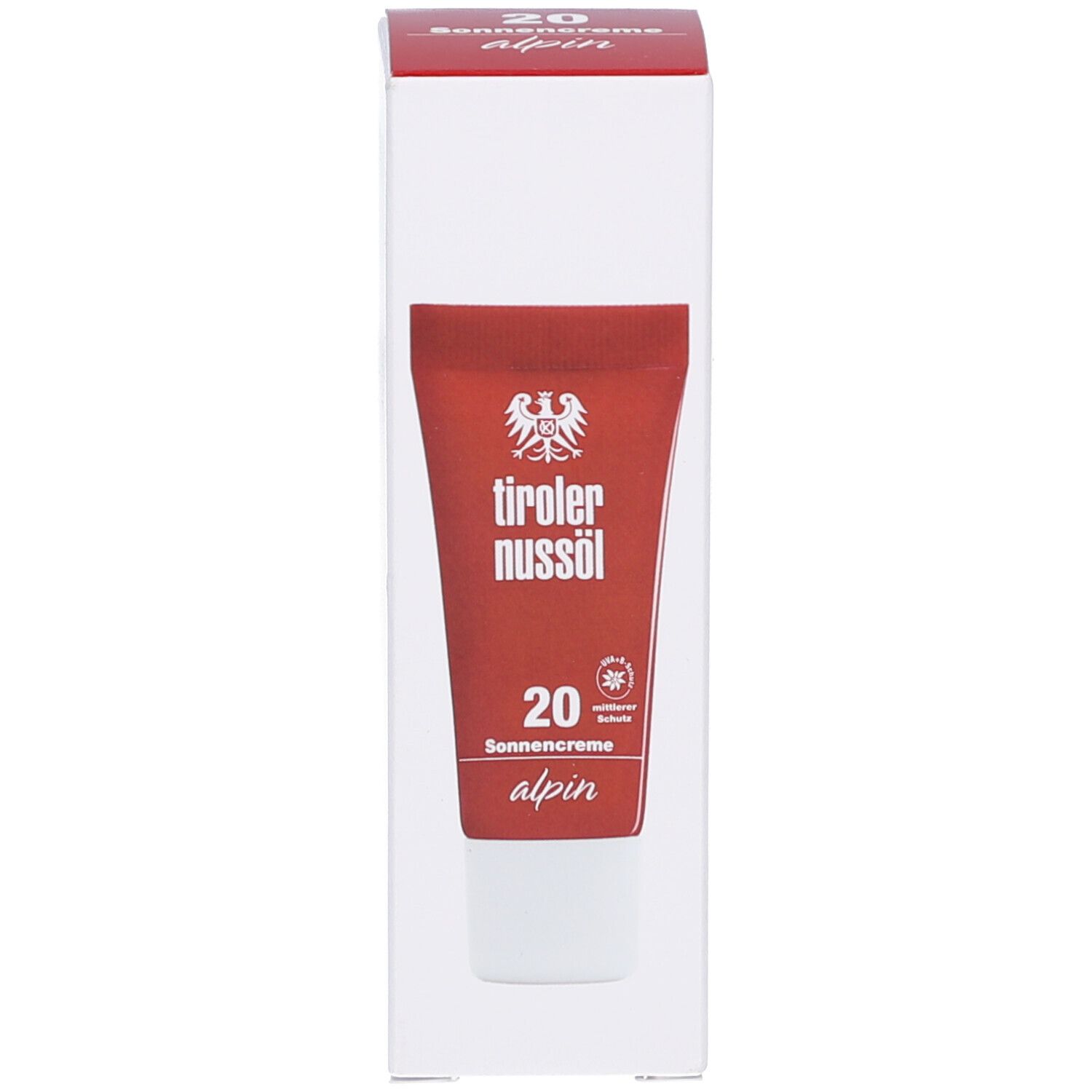 Produkt und Verpackung. Rote Tube und weiße Schachtel. Aufschrift: tiroler nussöl, 20 Sonnencreme alpin.