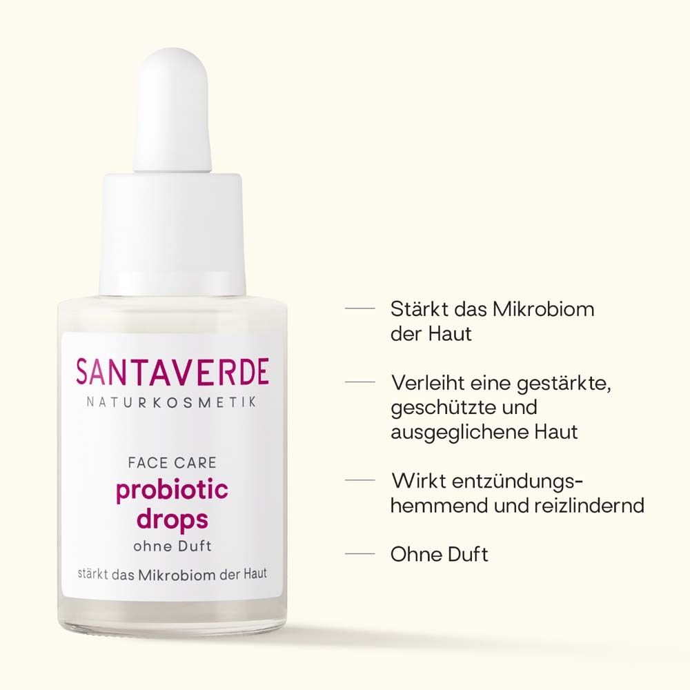 Glasflasche mit Serum und Pipette. Aufschrift: SANTAVERDE, probiotic drops, ohne Duft. Text: Stärkt das Mikrobiom der Haut.