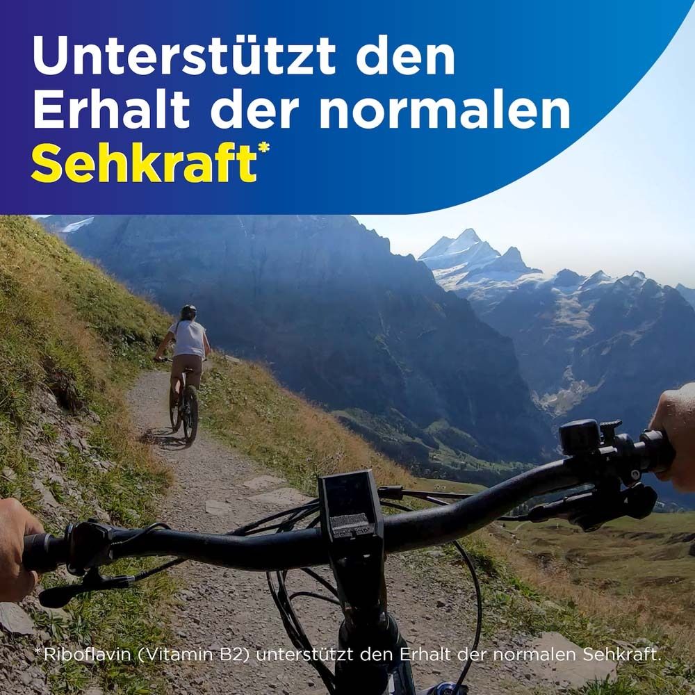 Personne fait du vélo en montagne. Texte : Soutient le maintien d'une vision normale.