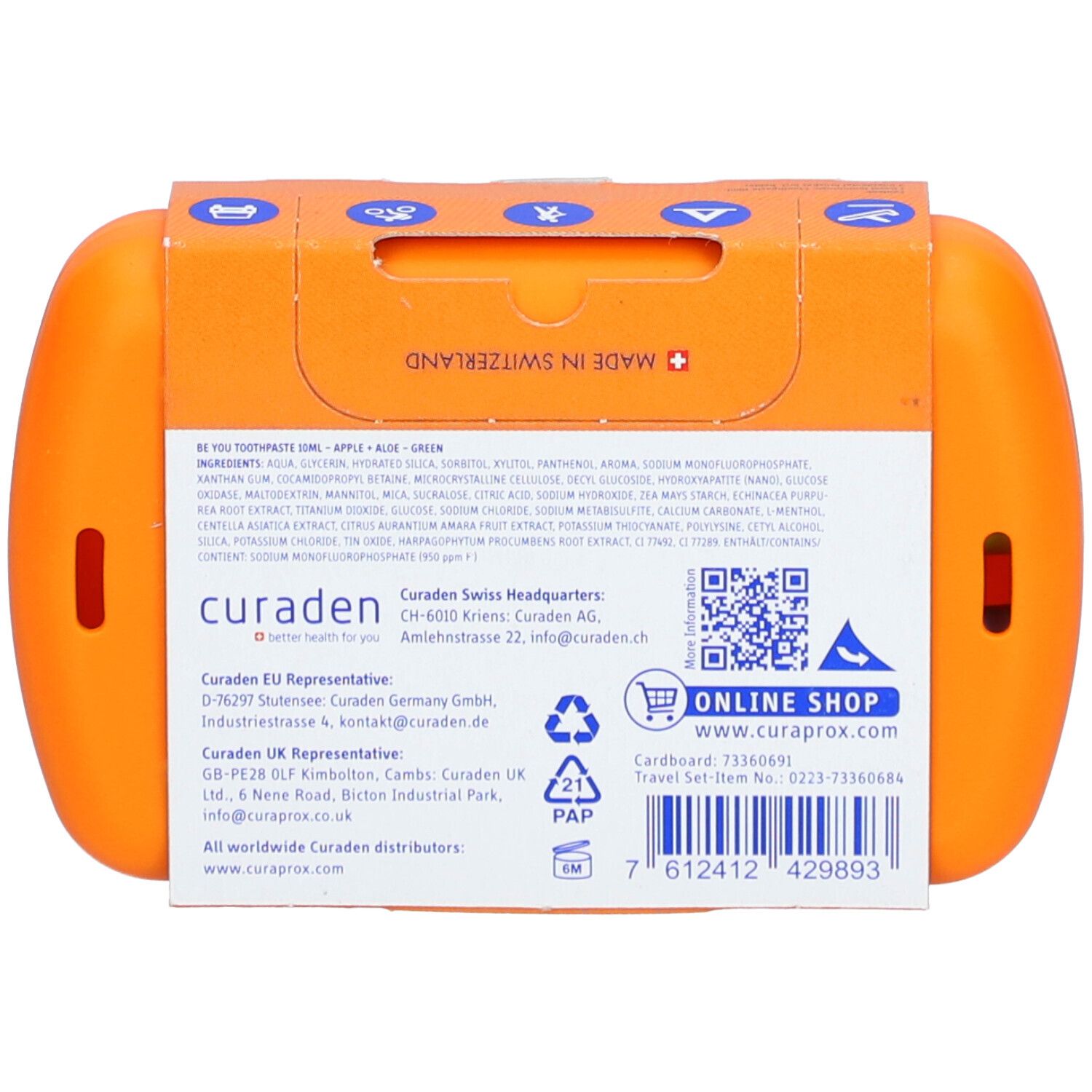 Rückseite des orangefarbenen Reise-Sets mit Produktinformationen und QR-Code. Hergestellt in der Schweiz.