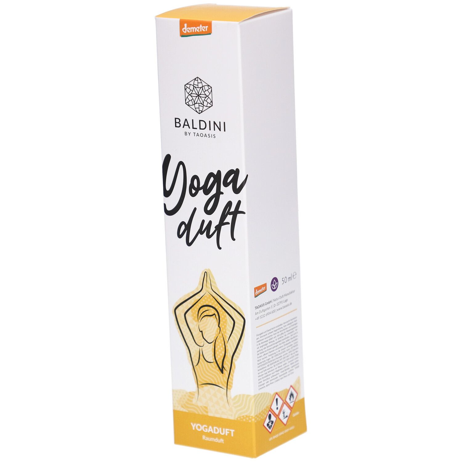 Weißer Karton mit Produktaufdruck. Logo, Schriftzug "Yoga duft" und Abbildung einer Person in Yoga-Pose. Demeter-Siegel.