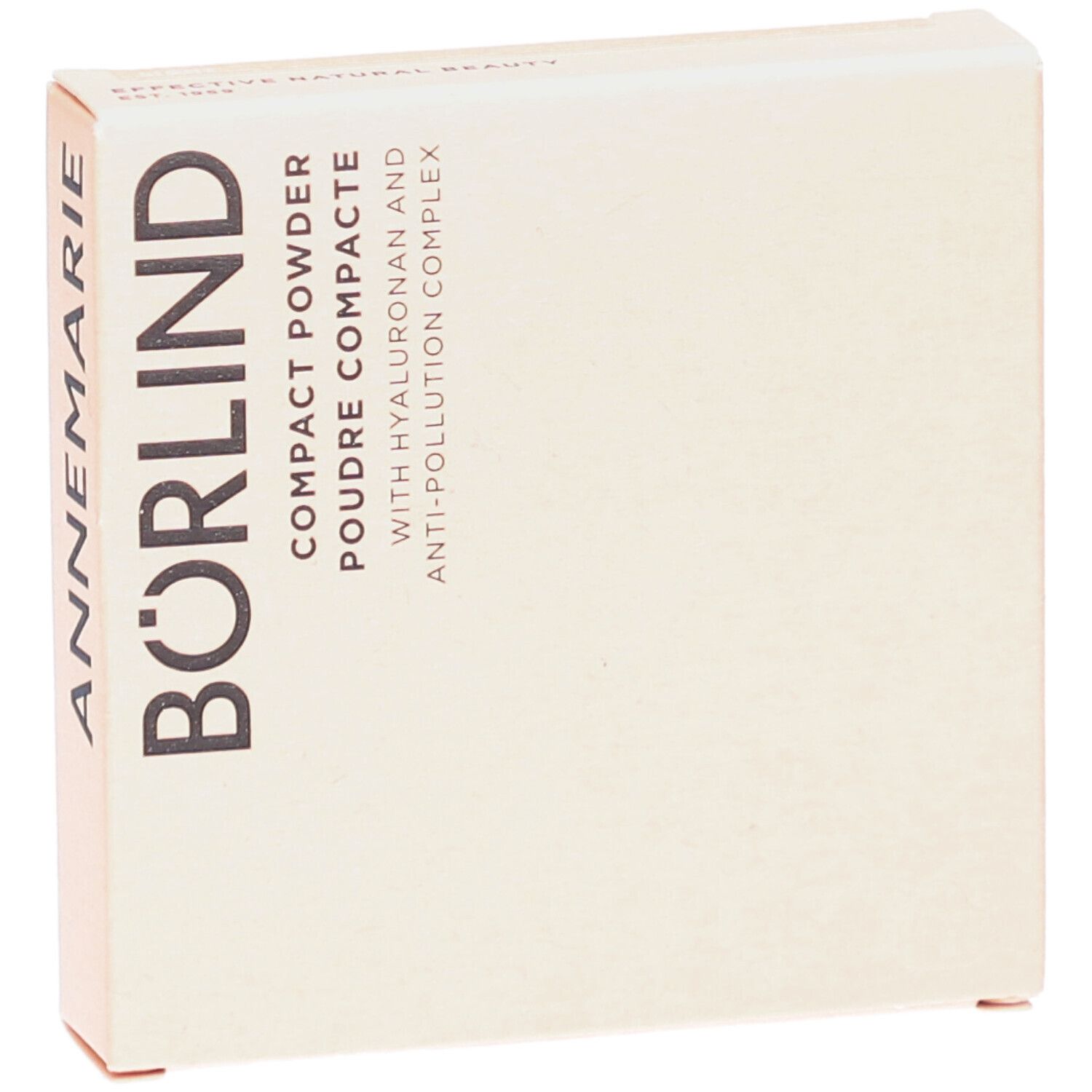 Boîte de poudre compacte beige. Inscription noire ANNEMARIE BÖRLIND. Texte: COMPACT POWDER, POUDRE COMPACTE.