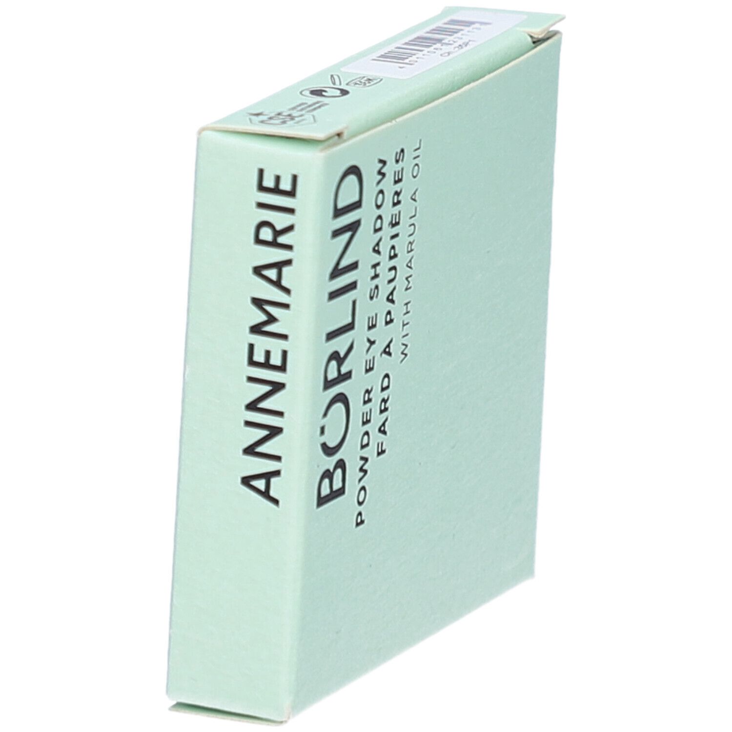 Hellgrüne Verpackung. Aufschrift: ANNEMARIE BÖRLIND, Powder Eye Shadow, Fard à paupières, with Marula Oil. Schrägansicht.