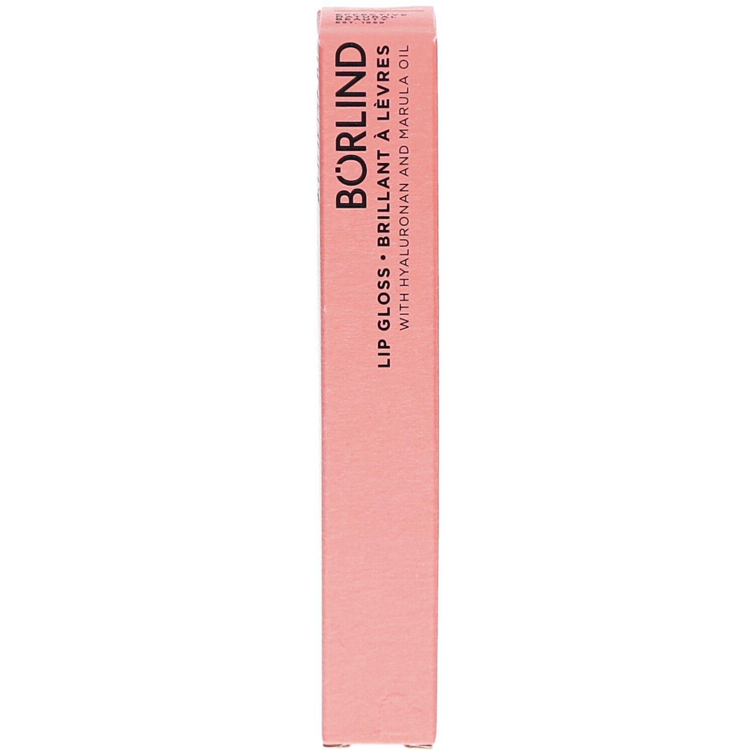 Emballage rose de Lipgloss ANNEMARIE BÖRLIND. Texte: LIP GLOSS, BRILLANT À LÈVRES, WITH HYALURONAN AND MARULA OIL.