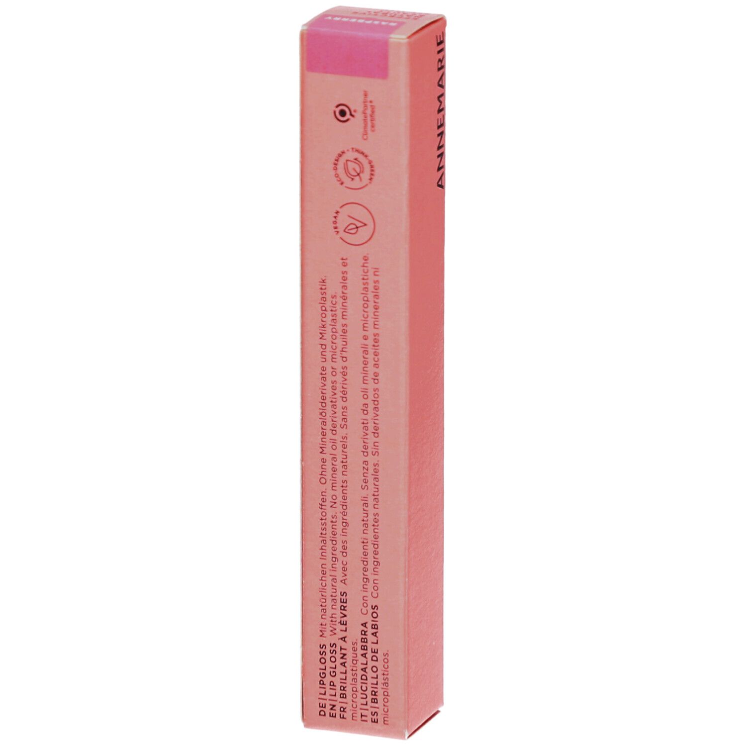Lipgloss-Tube mit schwarzem Deckel. Rosa schimmernde Textur sichtbar.